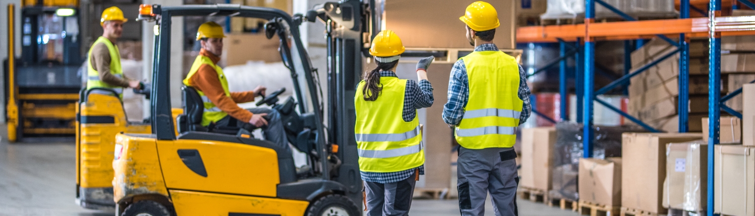 Manual workers working in warehouse